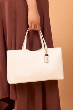 Model holding a bag