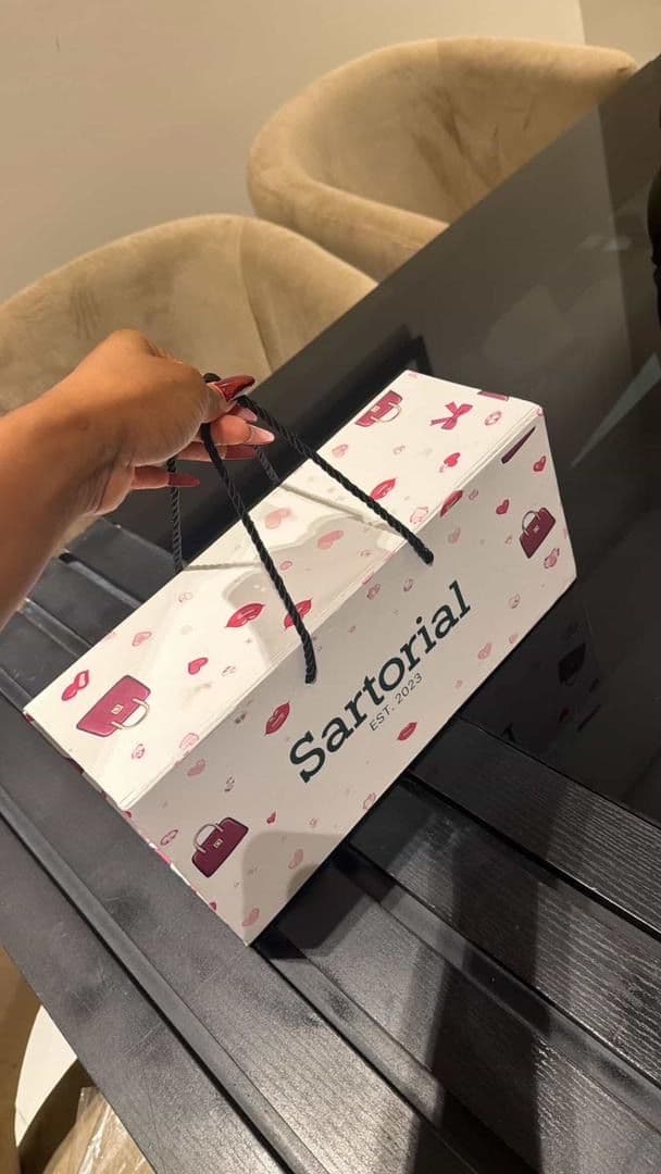 Hands holding a box