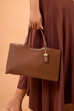 Hands holding a bag